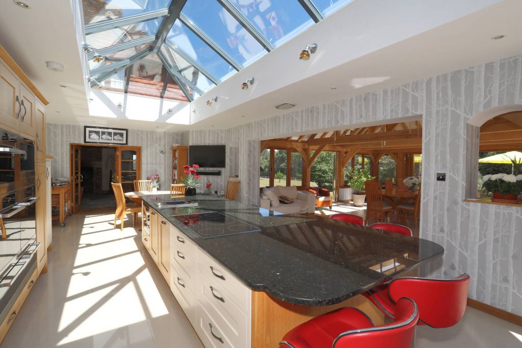 Outdoor Kitchen Pavilion with an island in the middle and glass ceiling
