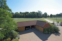 oak frame l-shaped garage complex