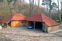 oak frame garage with car