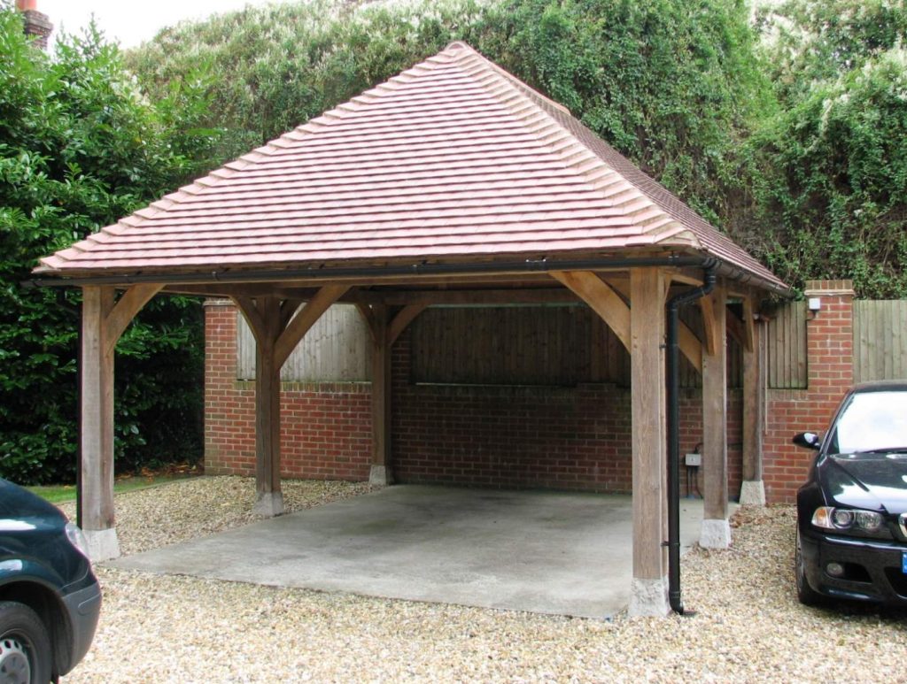 A timber carport at a shaded country property